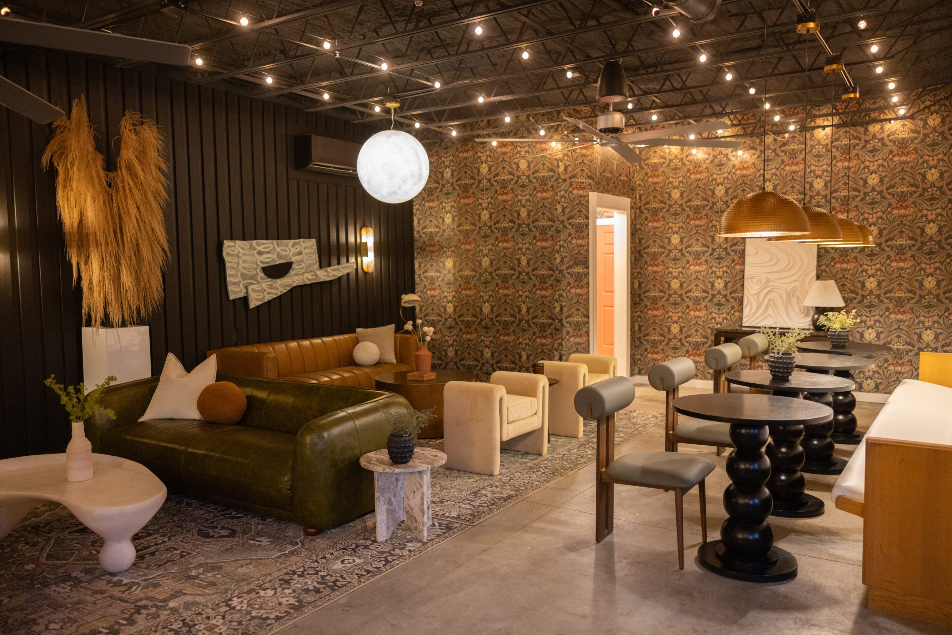 Cozy living room with warm lighting and modern decor.